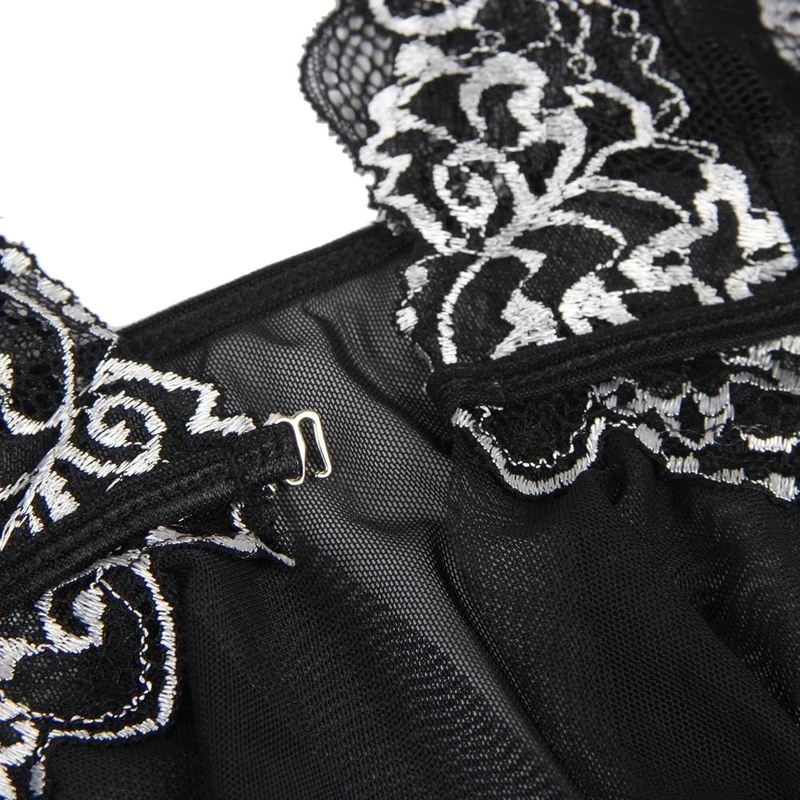 Schwarzes Babydoll aus Spitze – Tiefer V-Ausschnitt, unregelmäßiger Saum und neun Knöpfe vorne