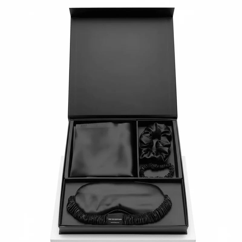 Schwarzes Luxus-Geschenkset aus 100 % Maulbeerseide: Kissenbezug, Schlafmaske, Augenbinde und Haargummis