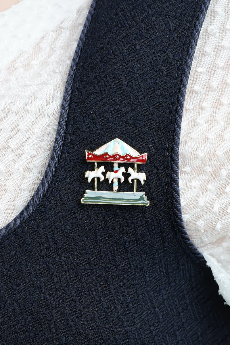Pin Karussell - gold bunt