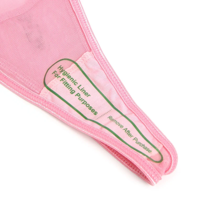 Rosa Babydoll aus Netzstoff mit 3D-Blumenstickerei, Schleifenverzierung, Rüschensaum, formgebendem Oberteil und passendem Höschen.