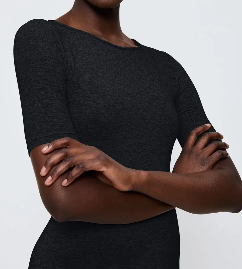 Triumph – Beauty Layers Kurzarmtop aus Wolle, Schwarz